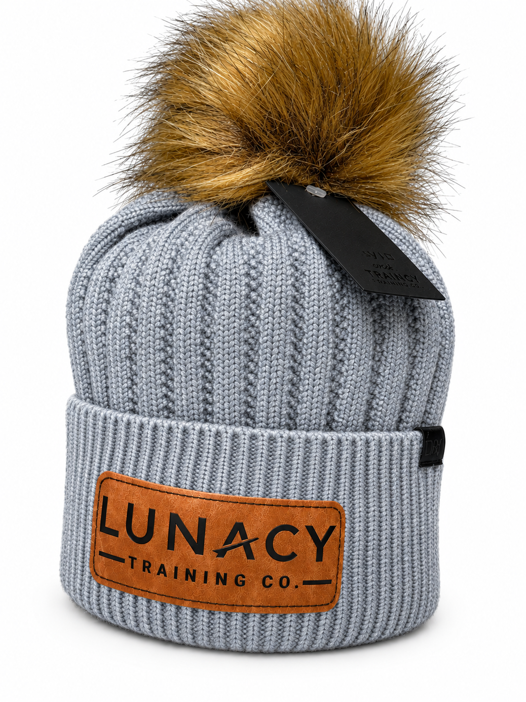 Knit beanie with faux fur pom pom